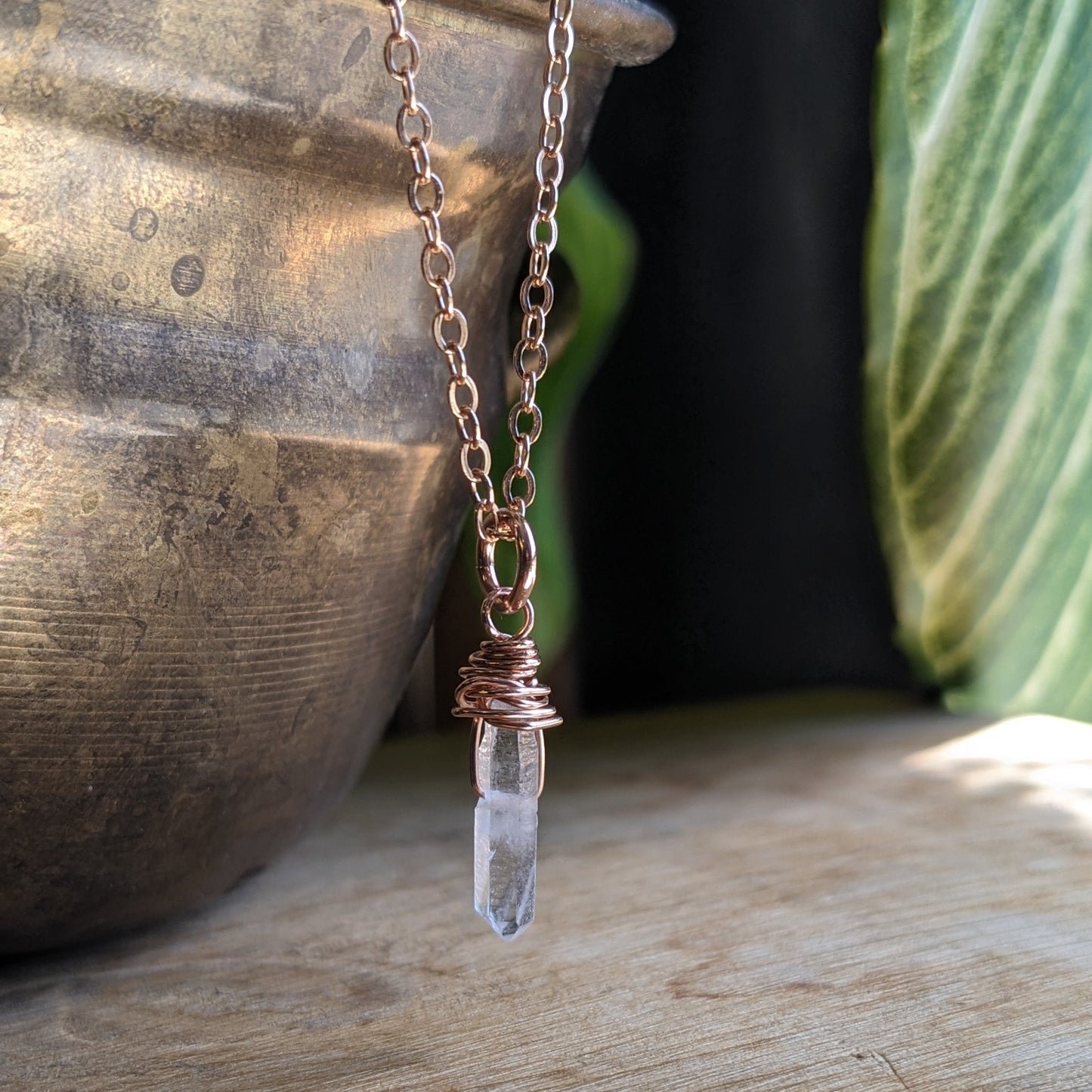 Tiny natural quartz pointe on Rose gold