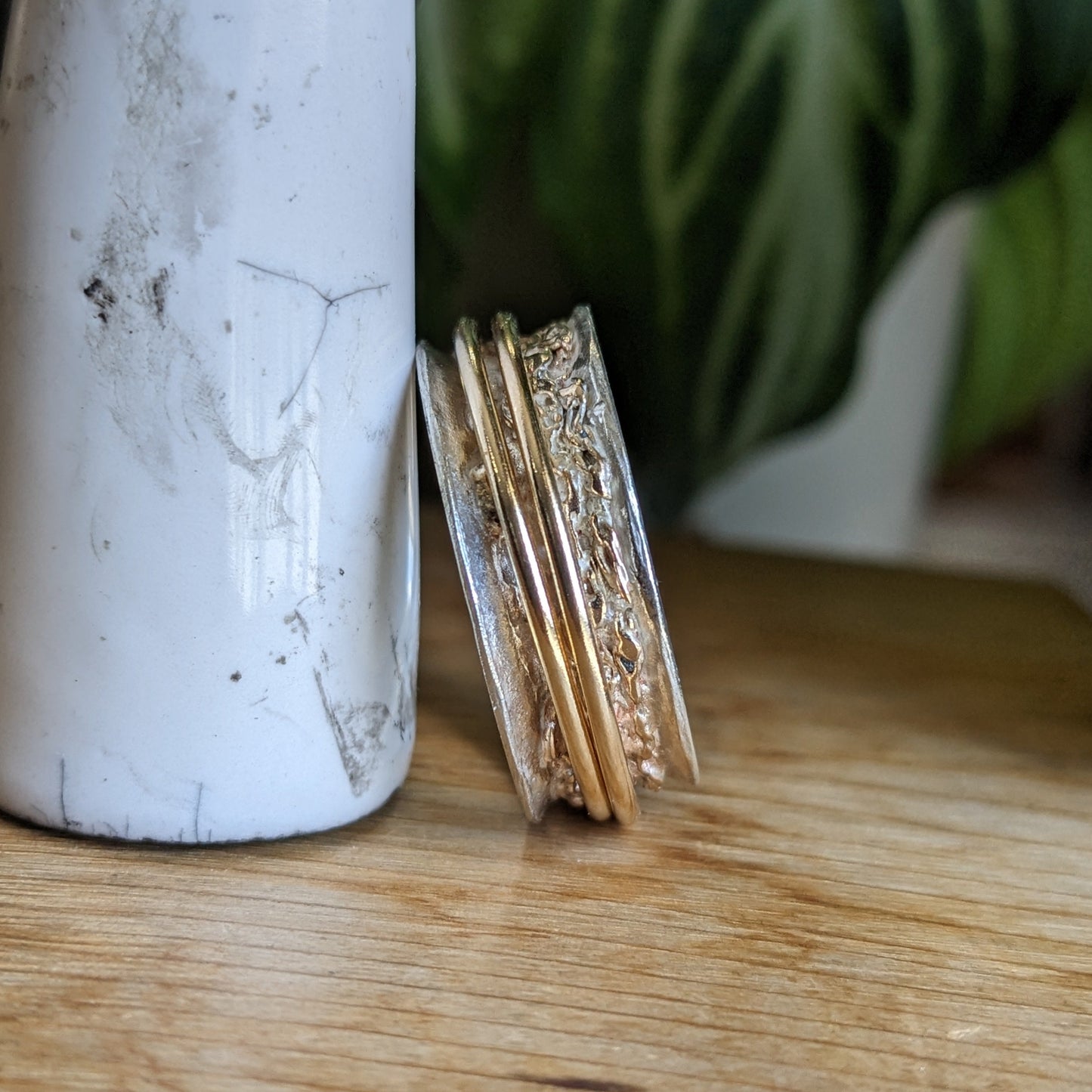 Melted gold spinner ring