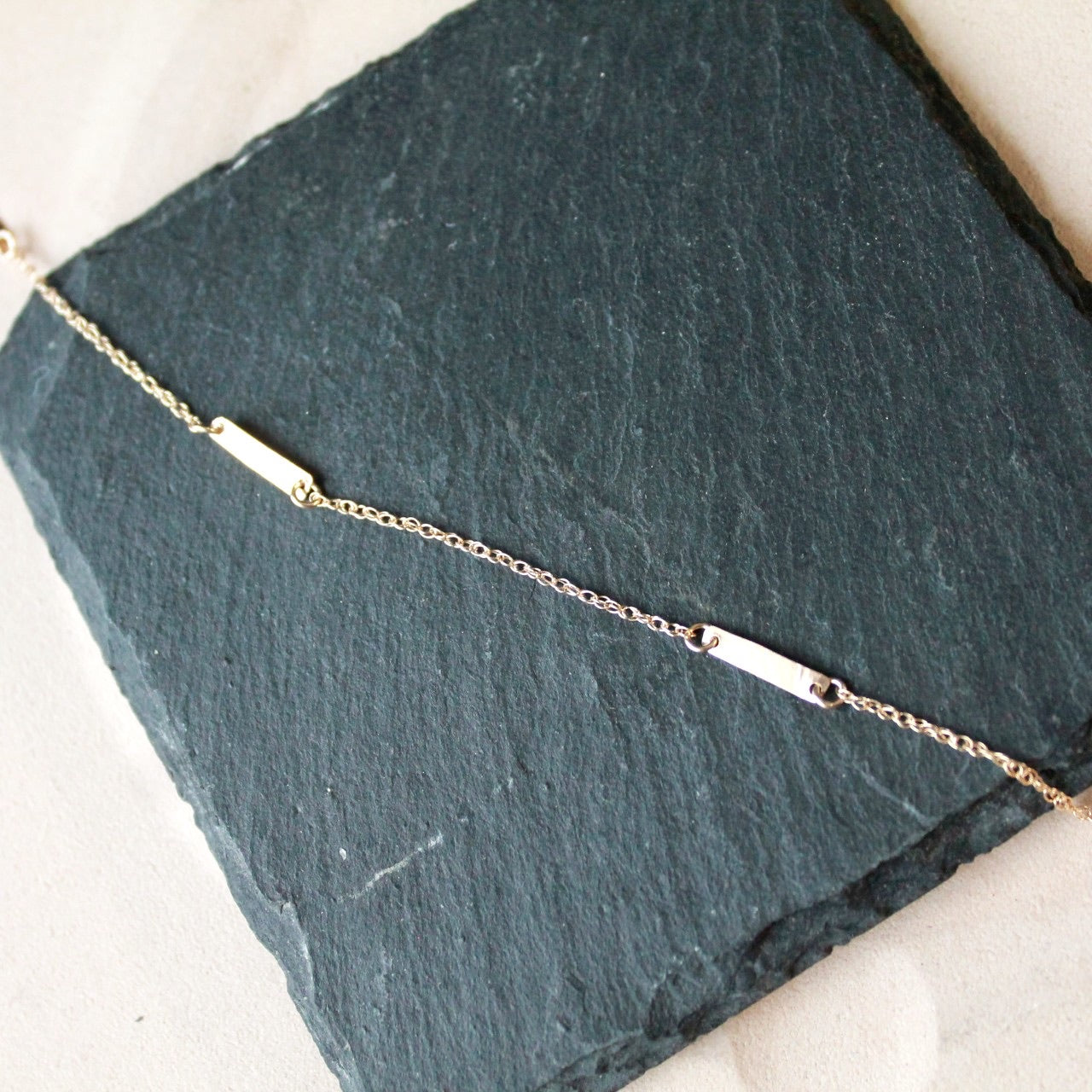 Collier barre d'or