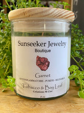 Load image into Gallery viewer, Tobacco &amp; Bay Leaf candle with Garnet gemstone