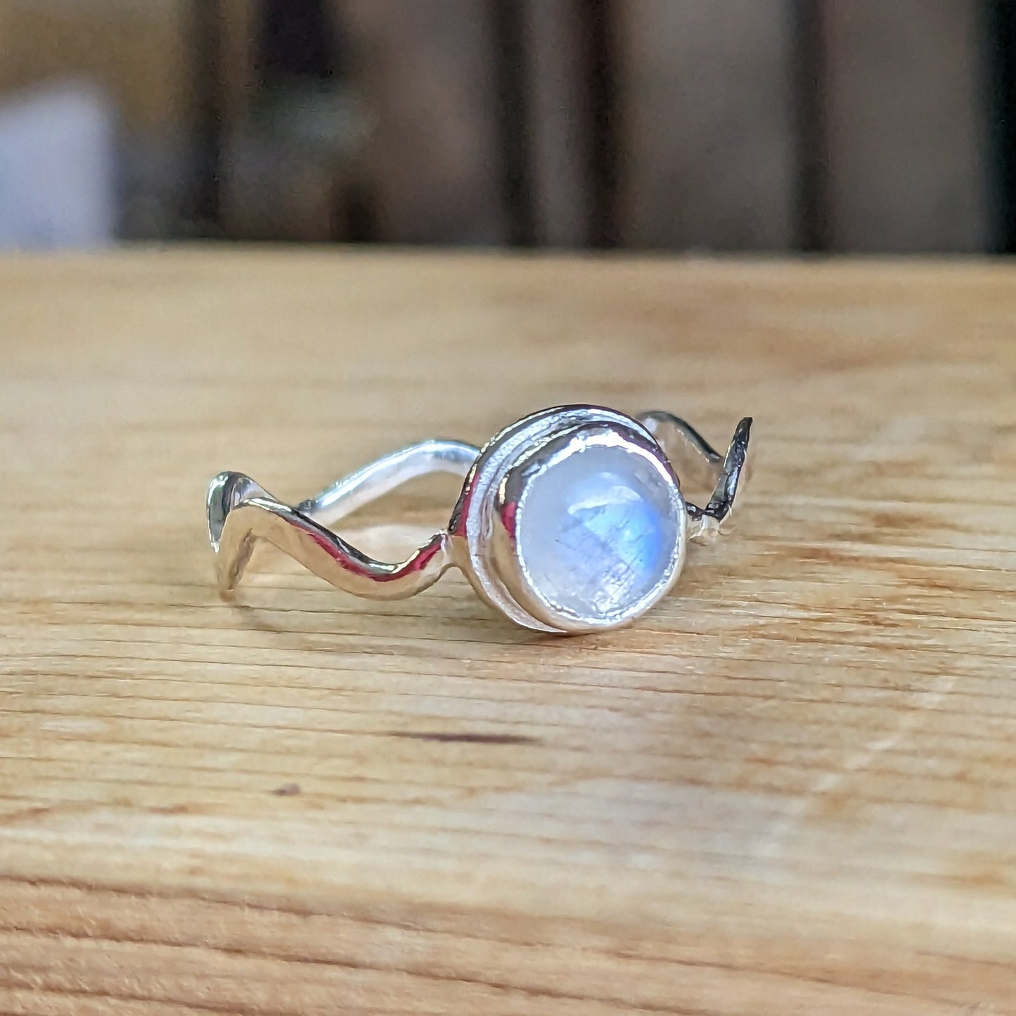 Rainbow moonstone and wave band ring