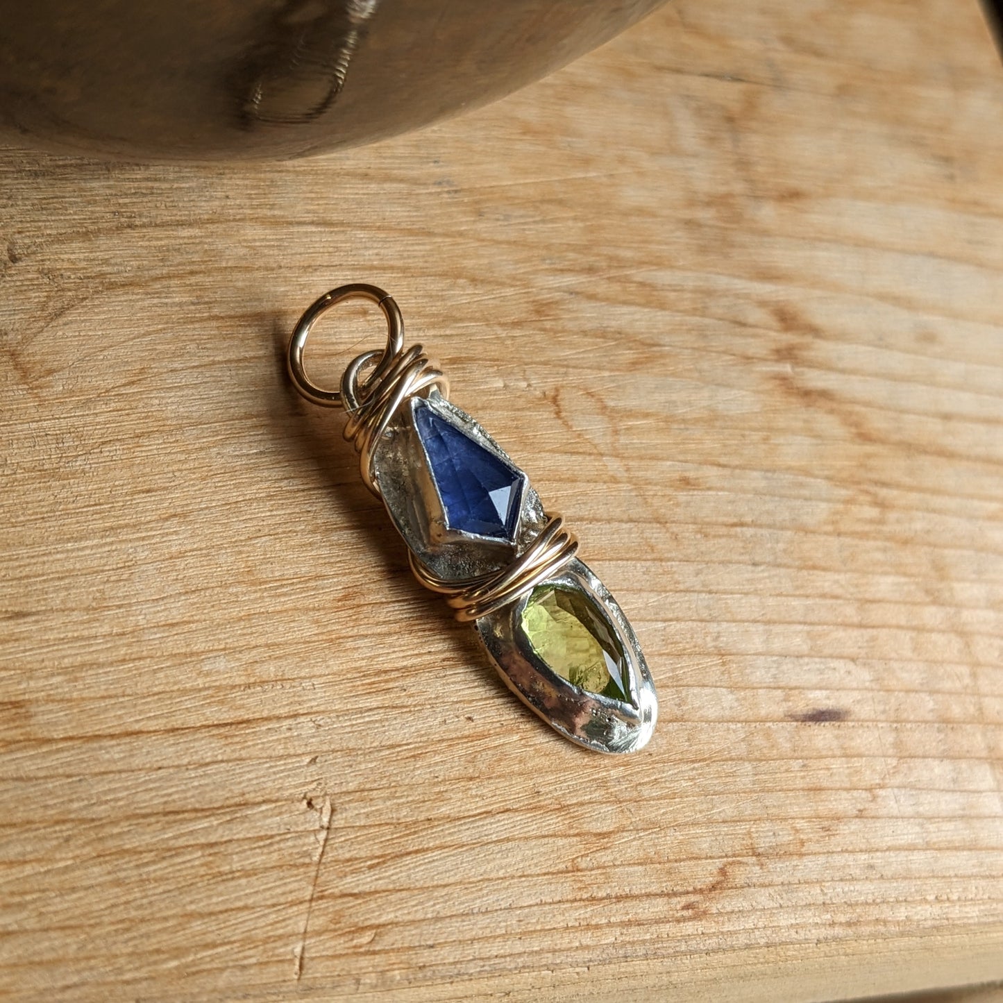Birthstones pendant with gold wire and sterling silver setting