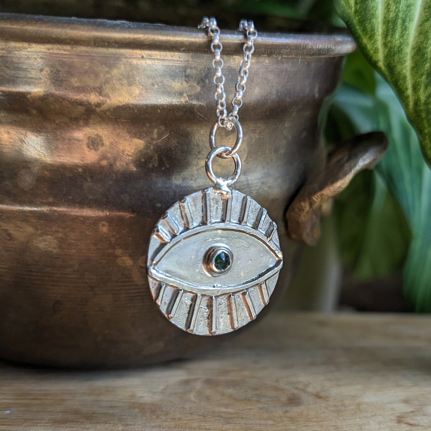 Evil eye protection medal with Emerald