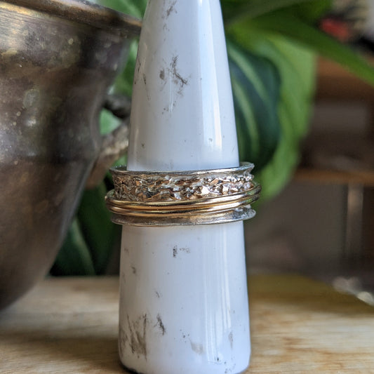 Melted gold spinner ring