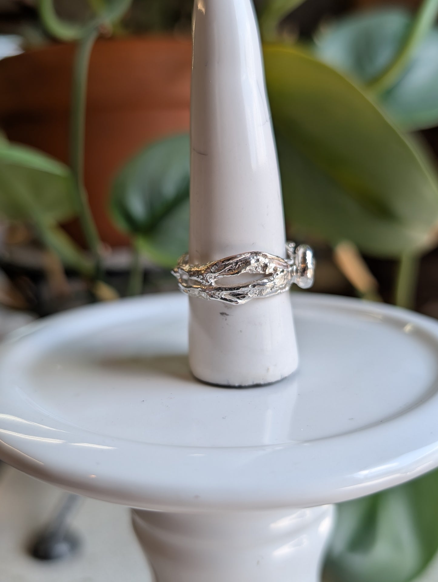 Moissanite heart and flowing silver ring